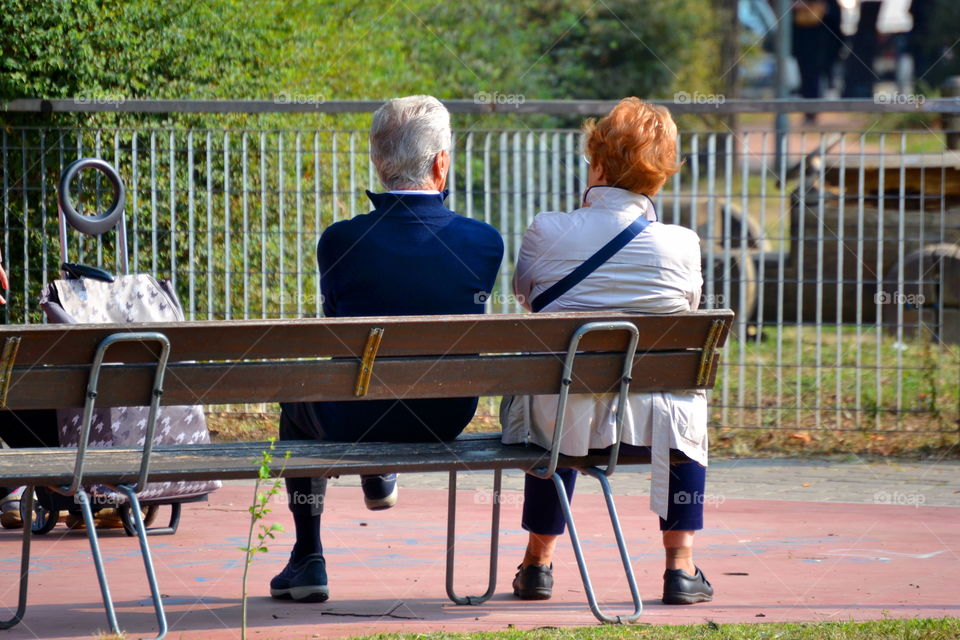 elderly relaxing in the park