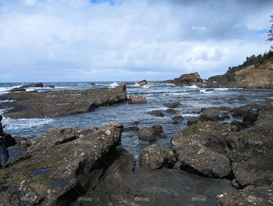 beautiful and gorgeous Oregon coastline, unique area, partly cloudy wonderful day