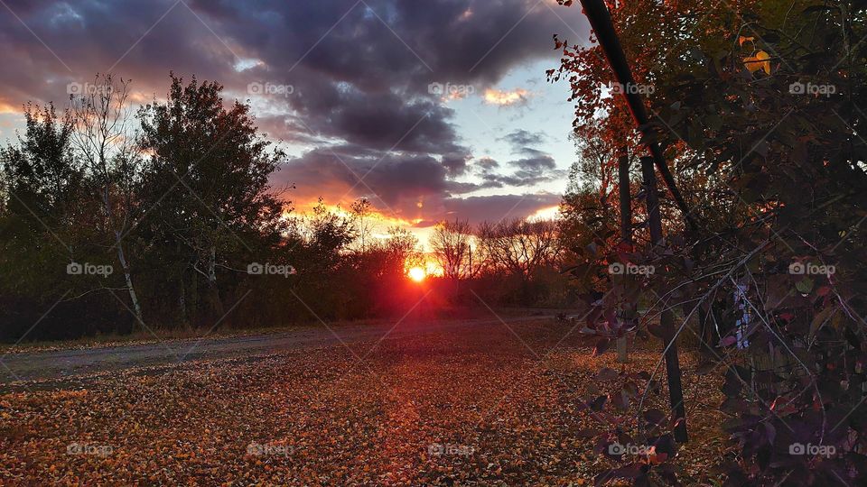 a beautiful sunset is seen in the sky