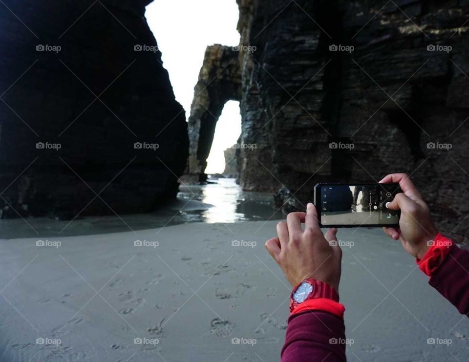 Beach#ocean#rocks#hands#mobile