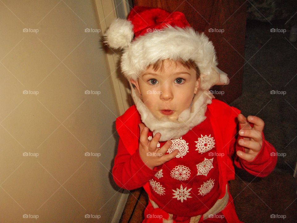 Boy In Santa Costume
