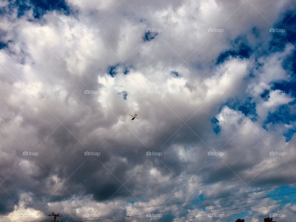 A helicopter in the cloud