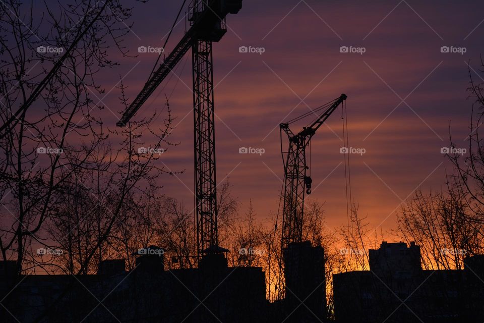 cranes building beautiful sunset 🌇