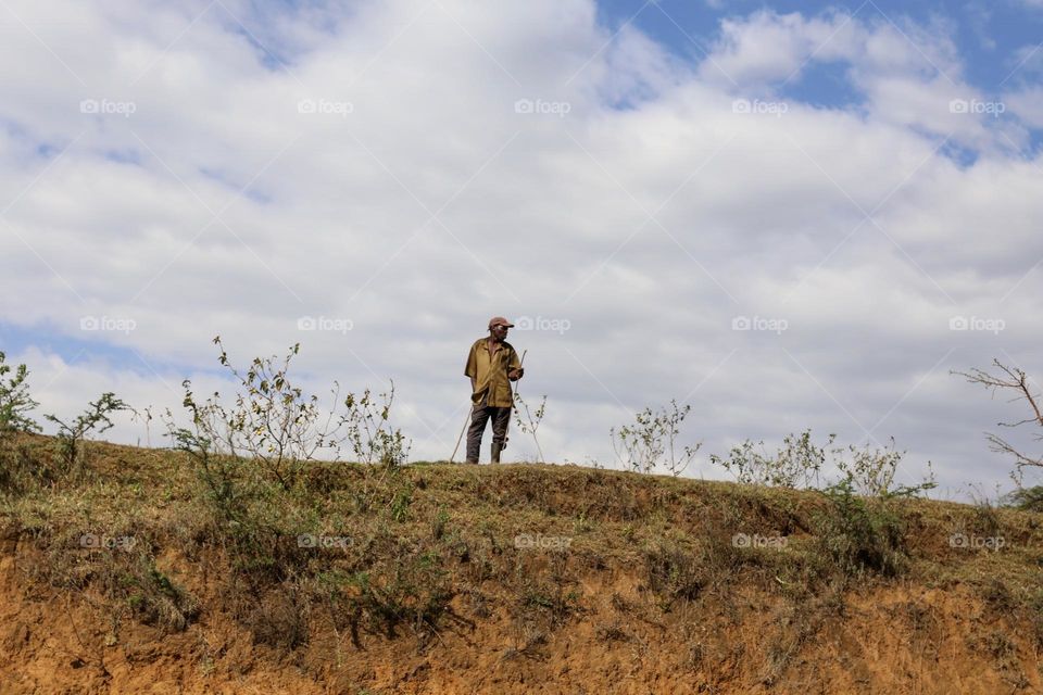 Man standing on hill
