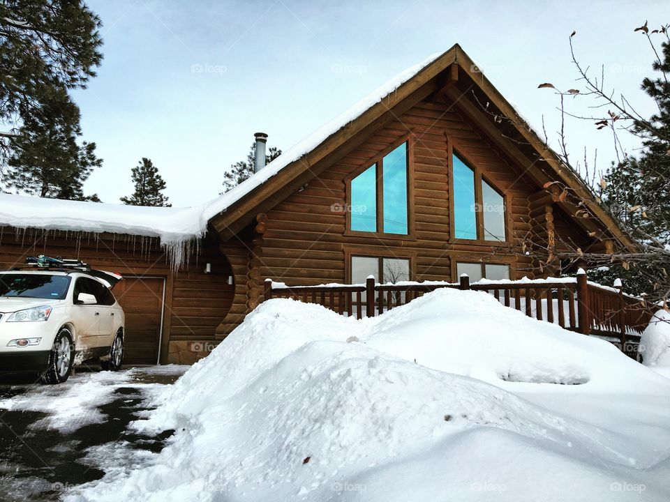 Cabin in Colorado covered in snow
