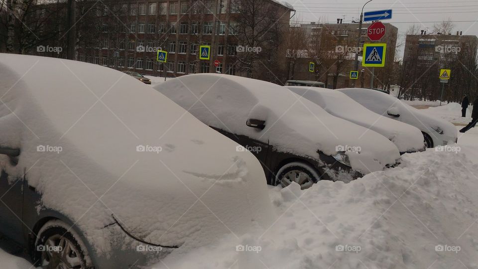 winter. cars under snow