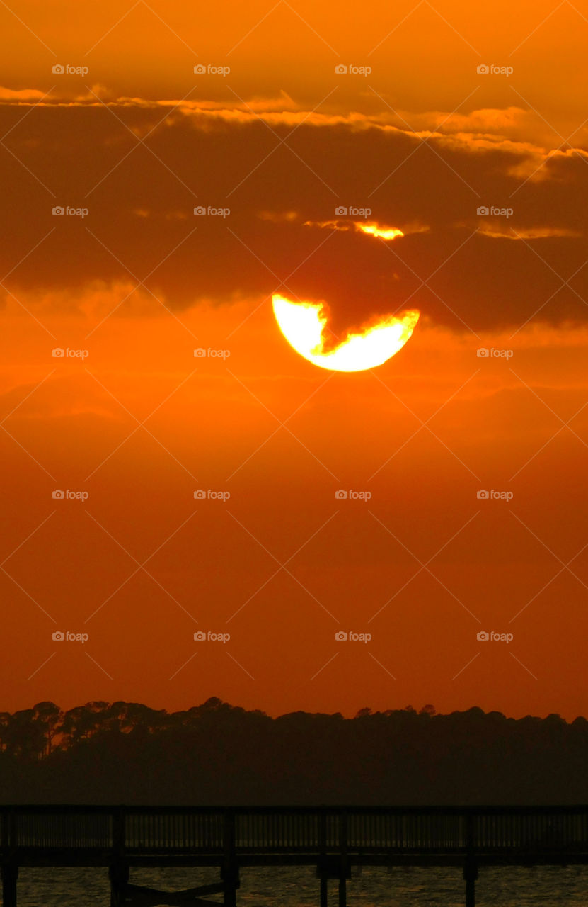 Scenic view of dramatic sky at sunset