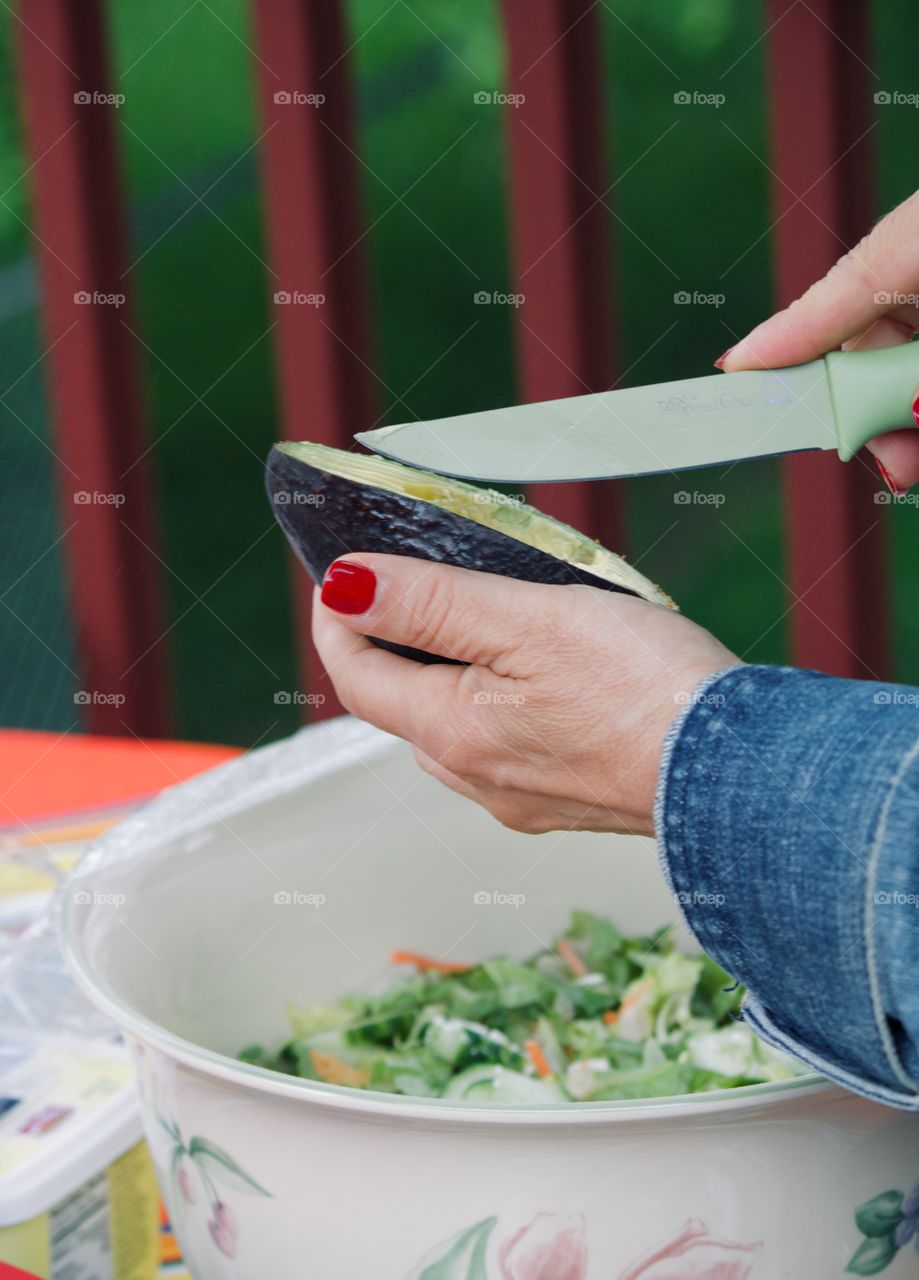 Making a salad for the picnic 