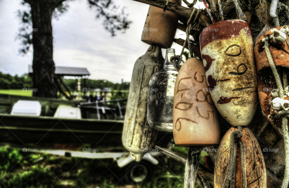 Buoy Tree. A local island home and their collection of buoys in the front yard. Tybee Island, GA.