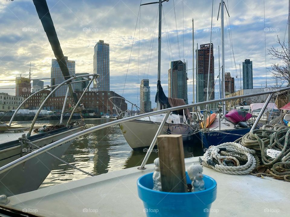 The view from “Salvation”, the “28 ft 1969 Luhrs” cabin cruiser, home to me and my man “Timothy Trespas” is fantastic. Aside from the boats at “Newtown Creek” in LIC we see “Greenpoint”, Bklyn on the left and “Manhattan”. 2023. Hypnotic Productions