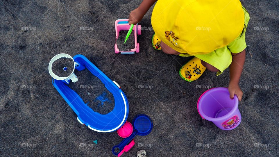 playing on the beach sand