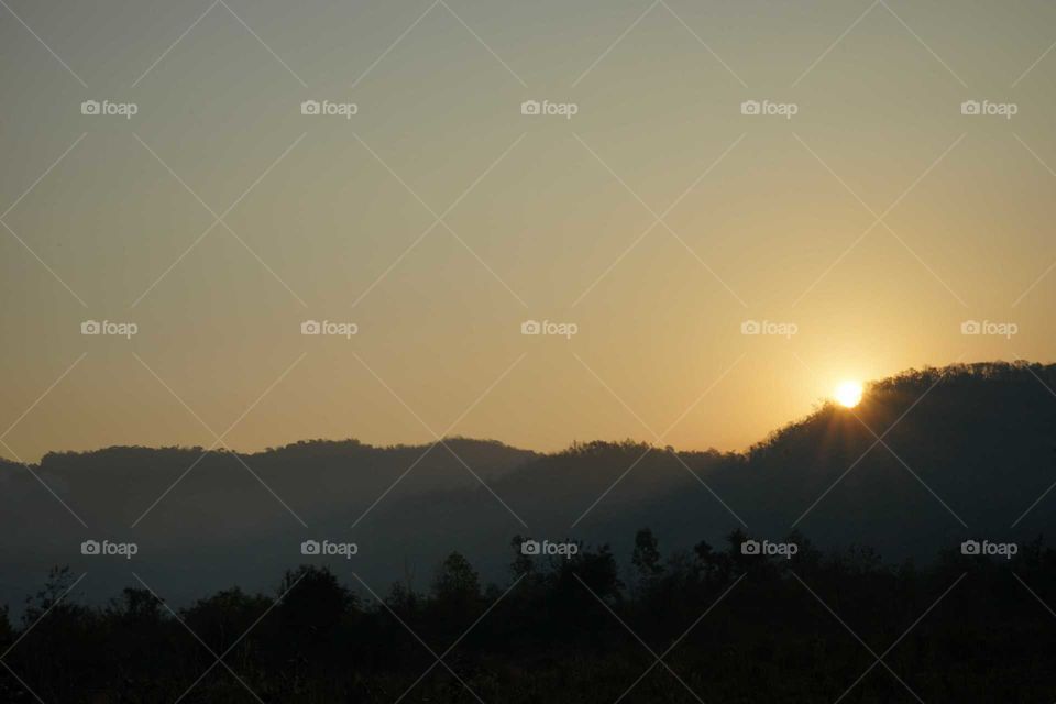 Sunrise and the mountain