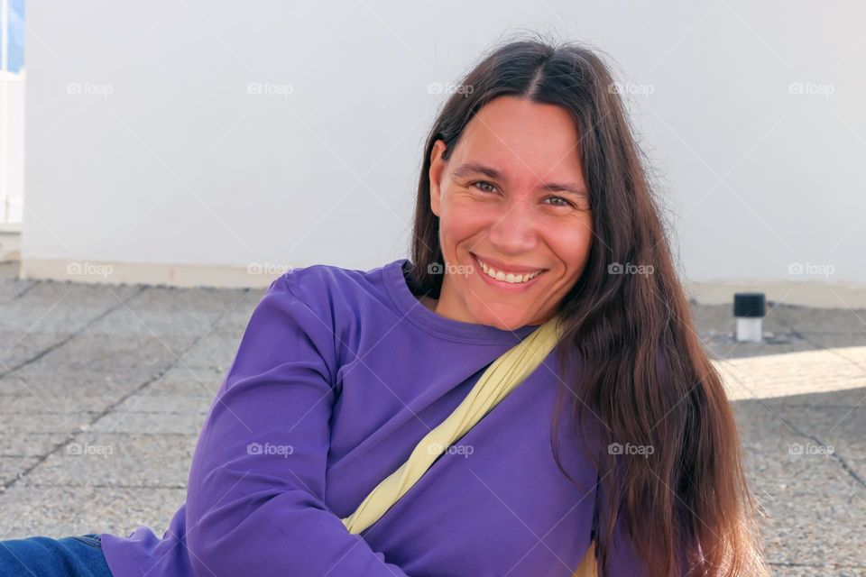 Portrait of young happy woman
