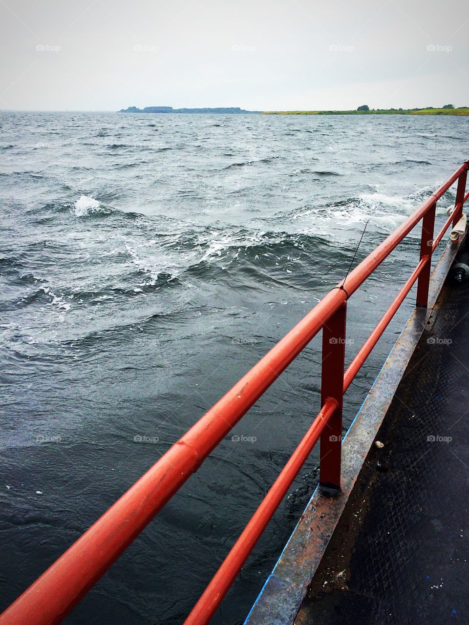 Railing of a ship at sea