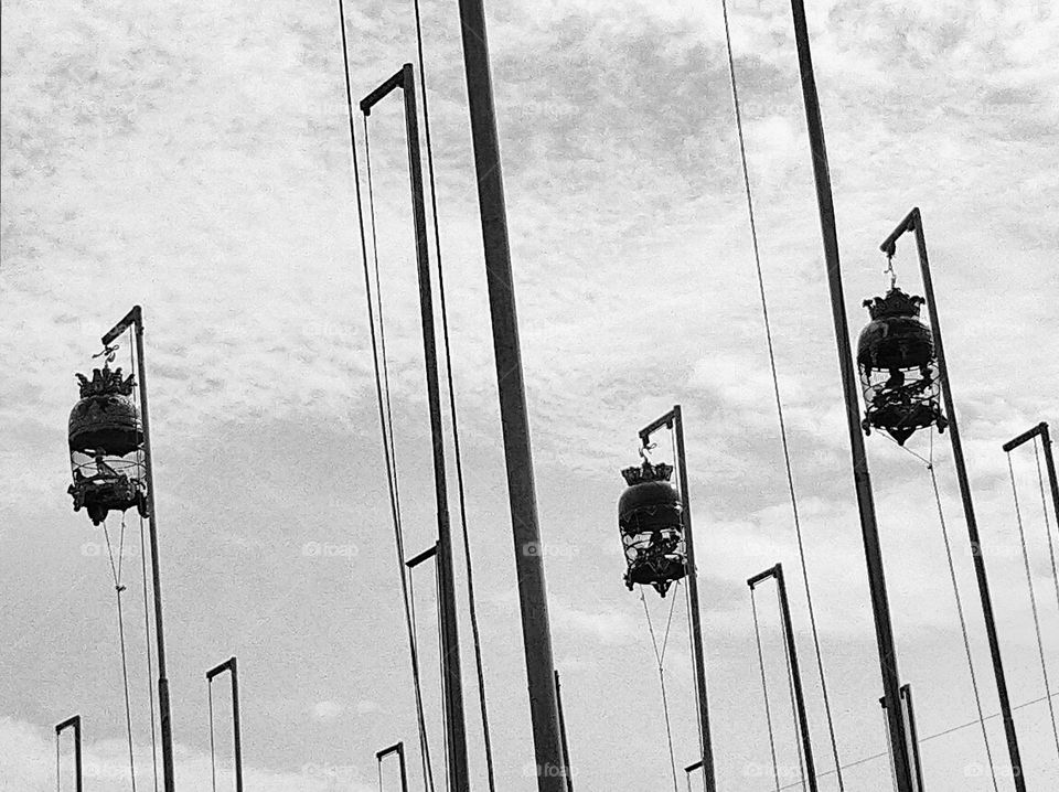 Shilouette of several bird cages