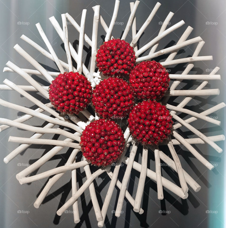 Red berries balls in a bowl
