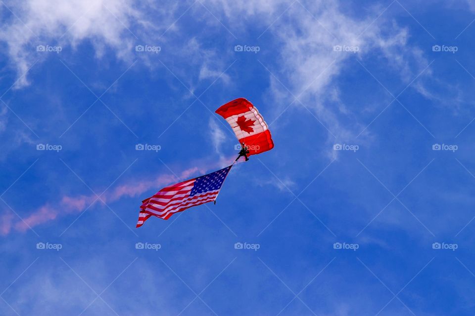 Flying with the Canadian and American flags
