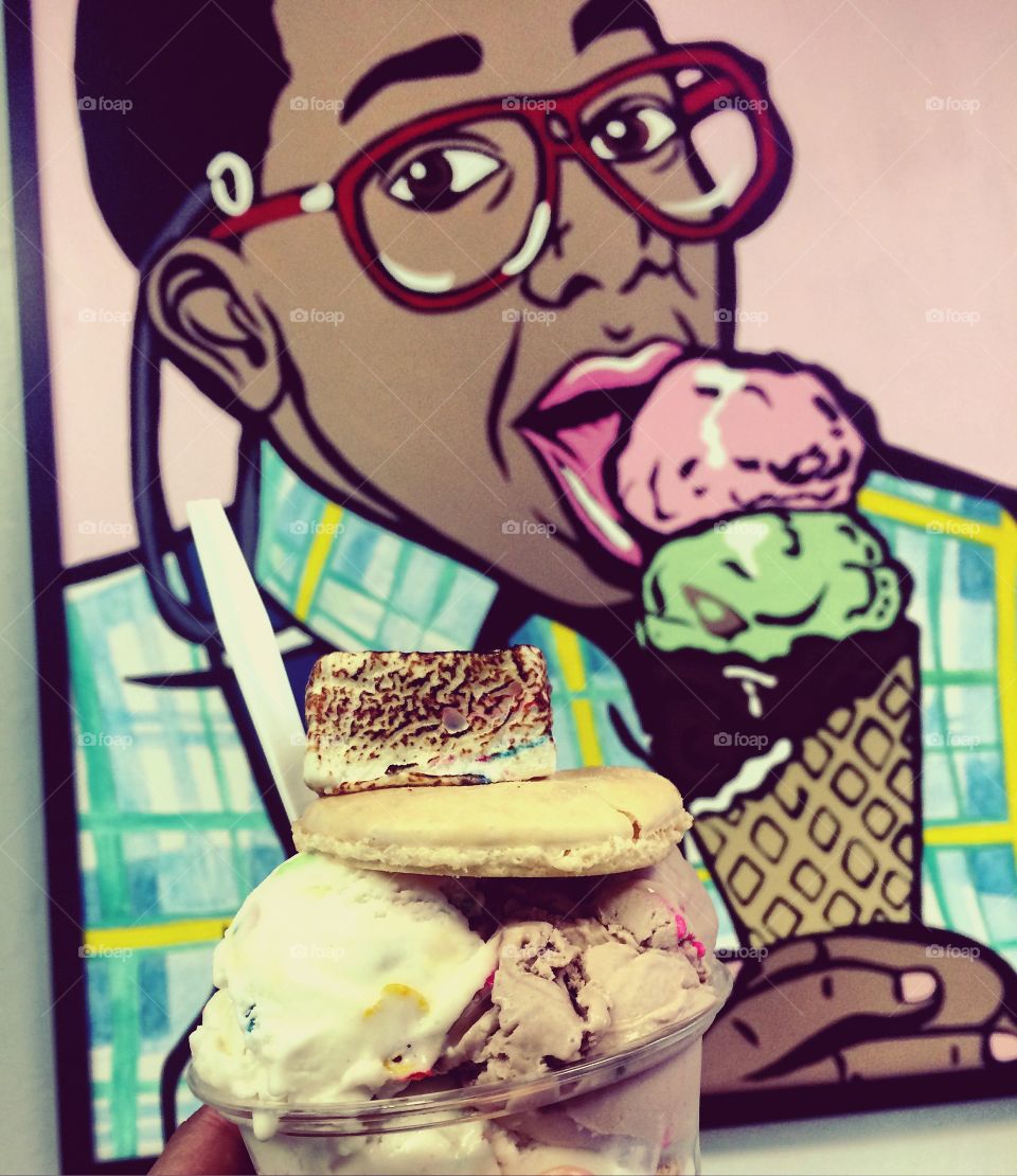 Ice cream in front of Urkel poster.