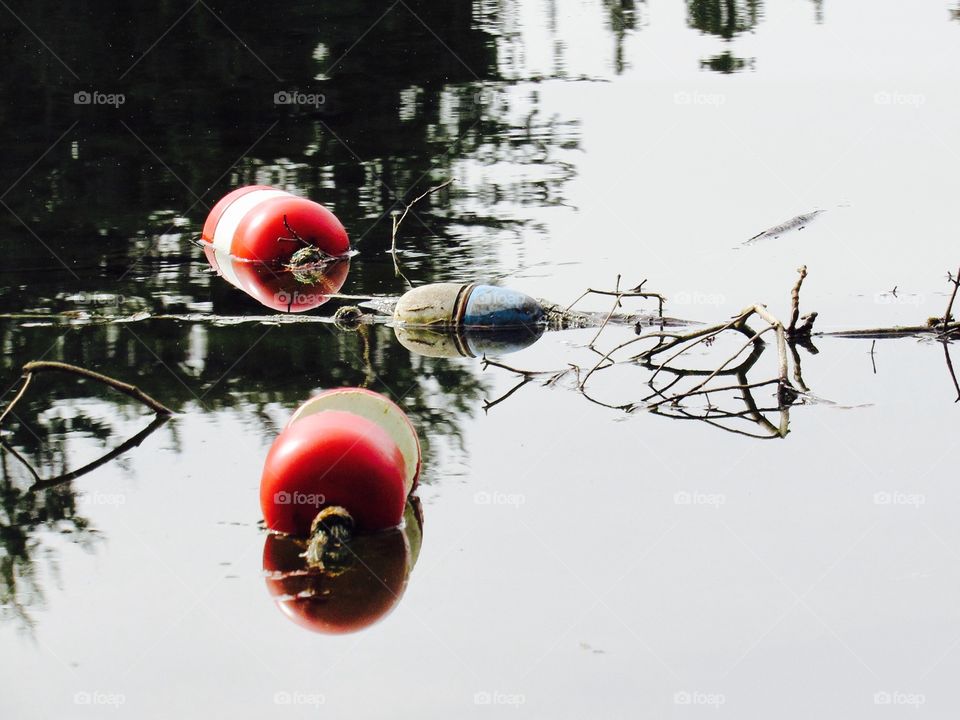 Buoy floating on water