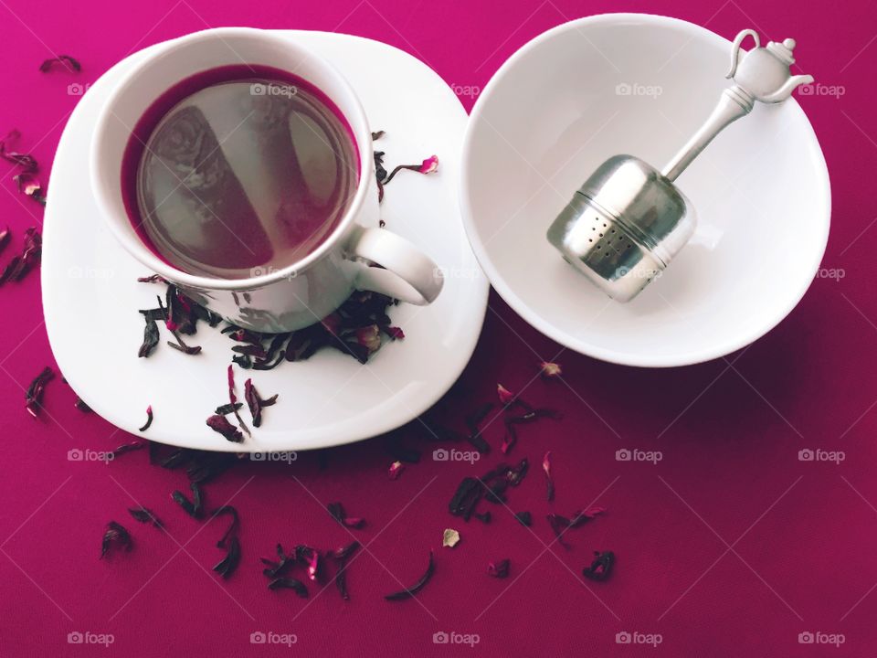 Hibiscus tea with tea strainer