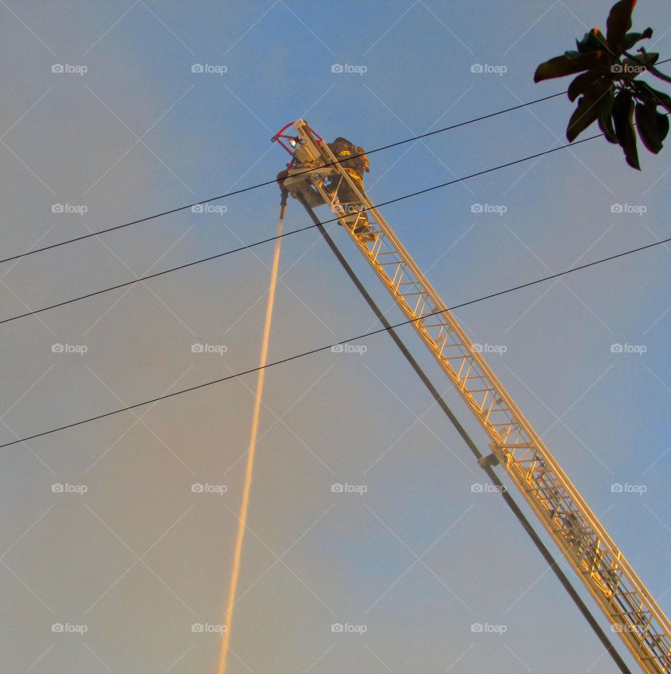 firefighter on a ladder