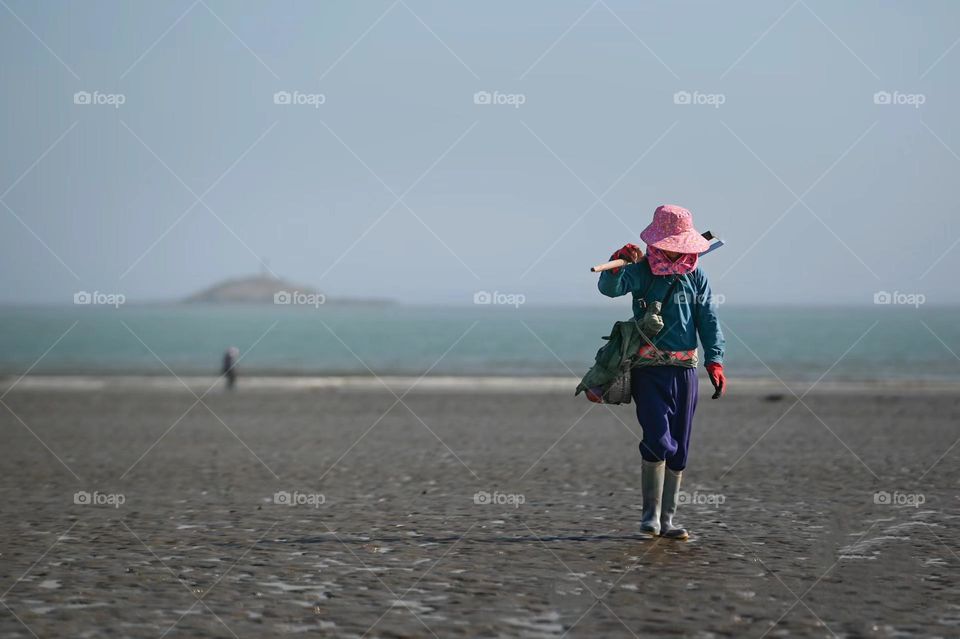 Seashore working women