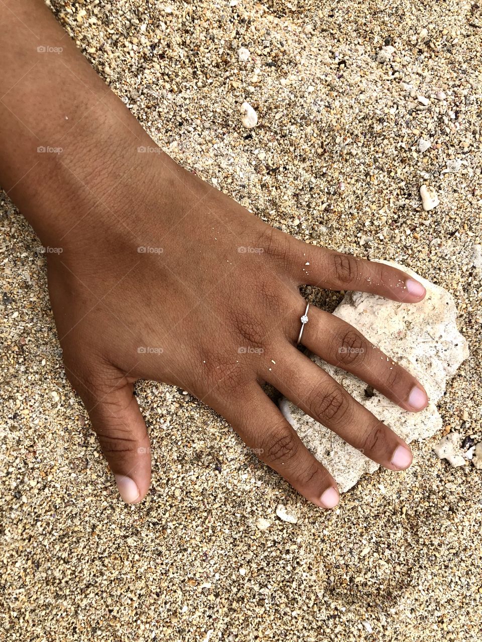 Engagement ring on the beach 