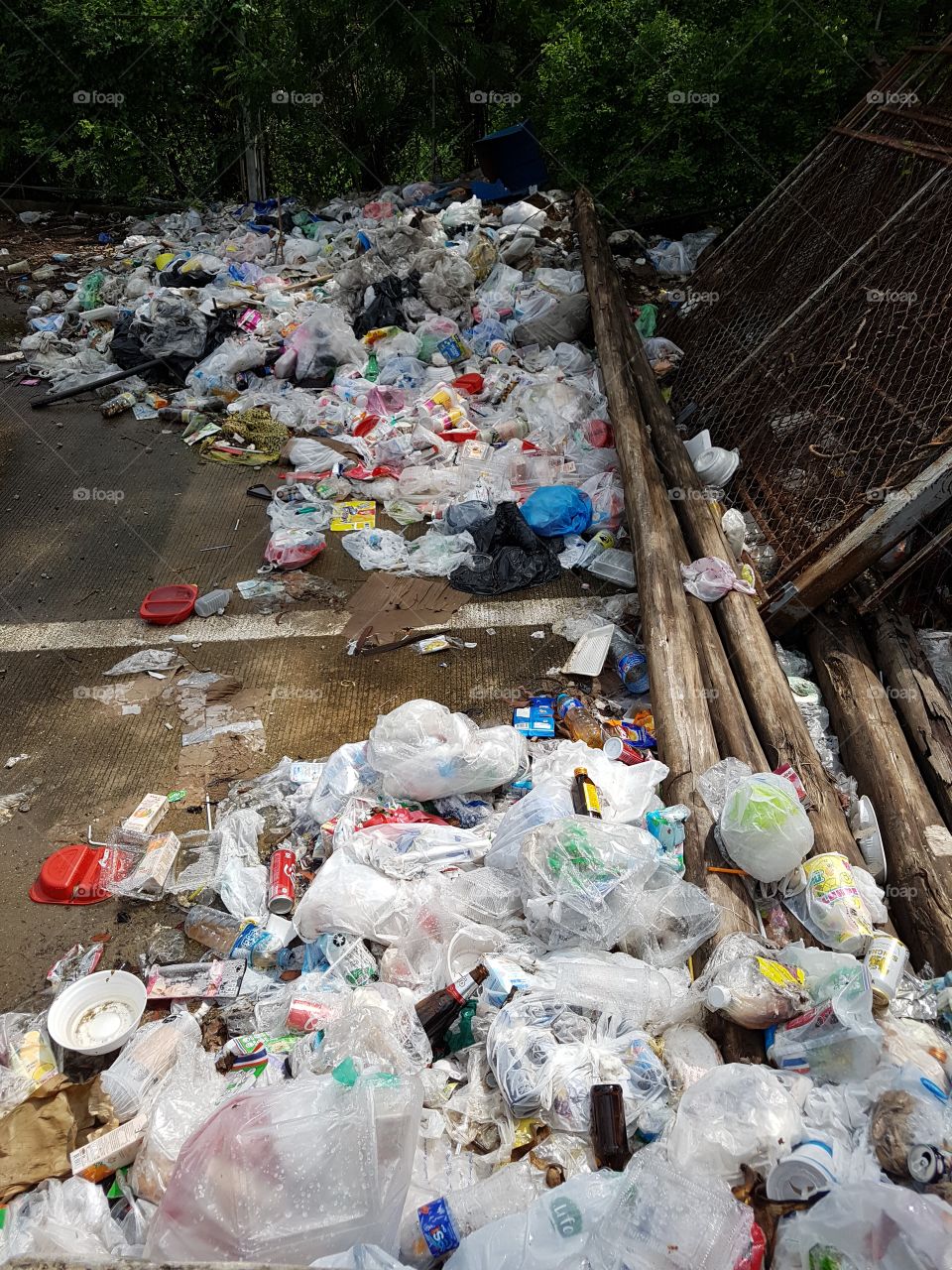 illegal wild dump, pile of garbage outdoor on the street