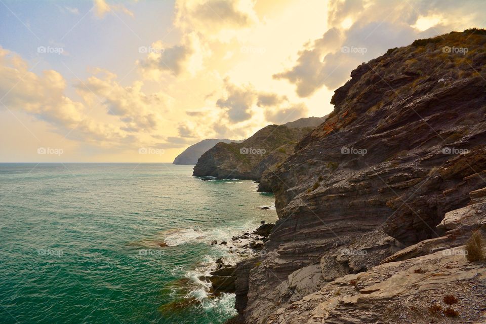 Sunset at the cliffs of La Manga in Spain 