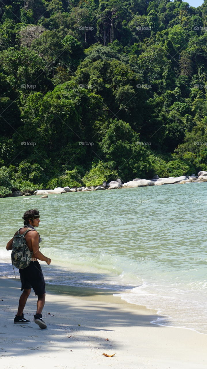 Myself lost on the beaches of Penang national park, Malaysia after a trek through the jungle.