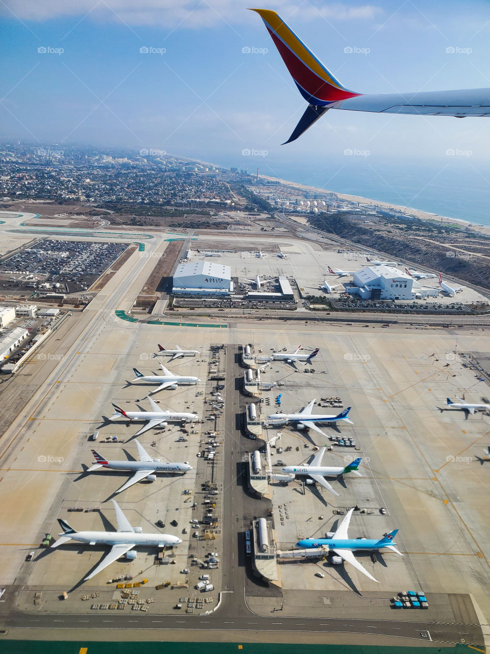 Passenger jets are seen on the ground after taking off from Los Angeles International Airport
