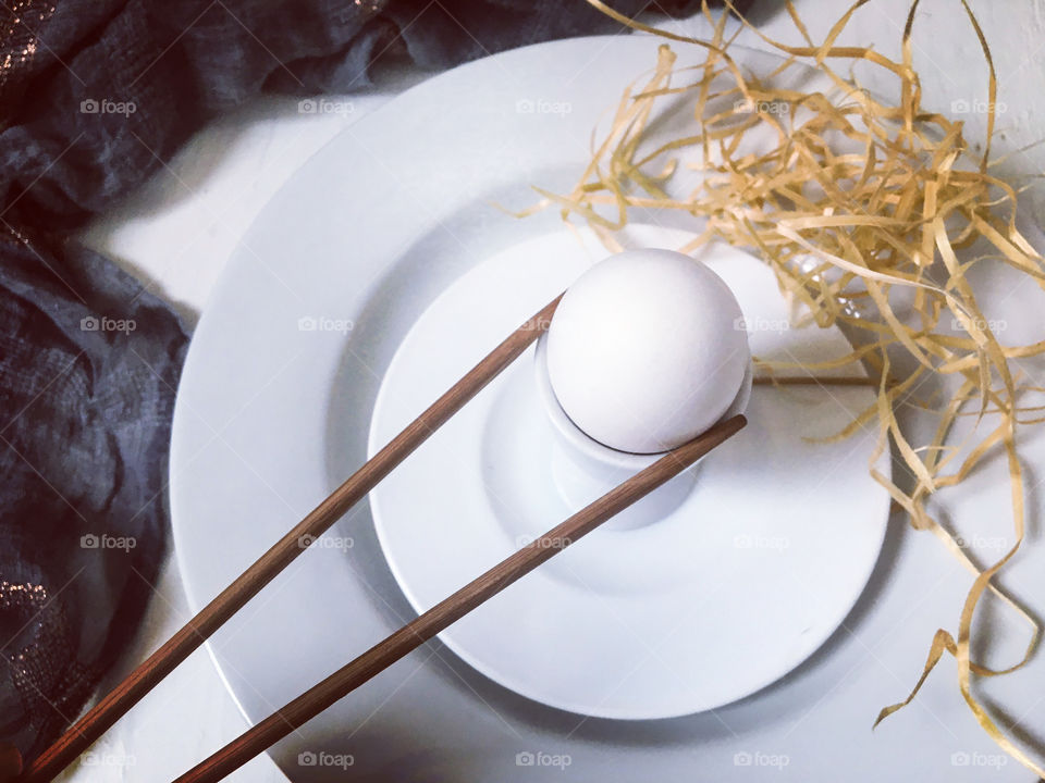 White egg on a white plate