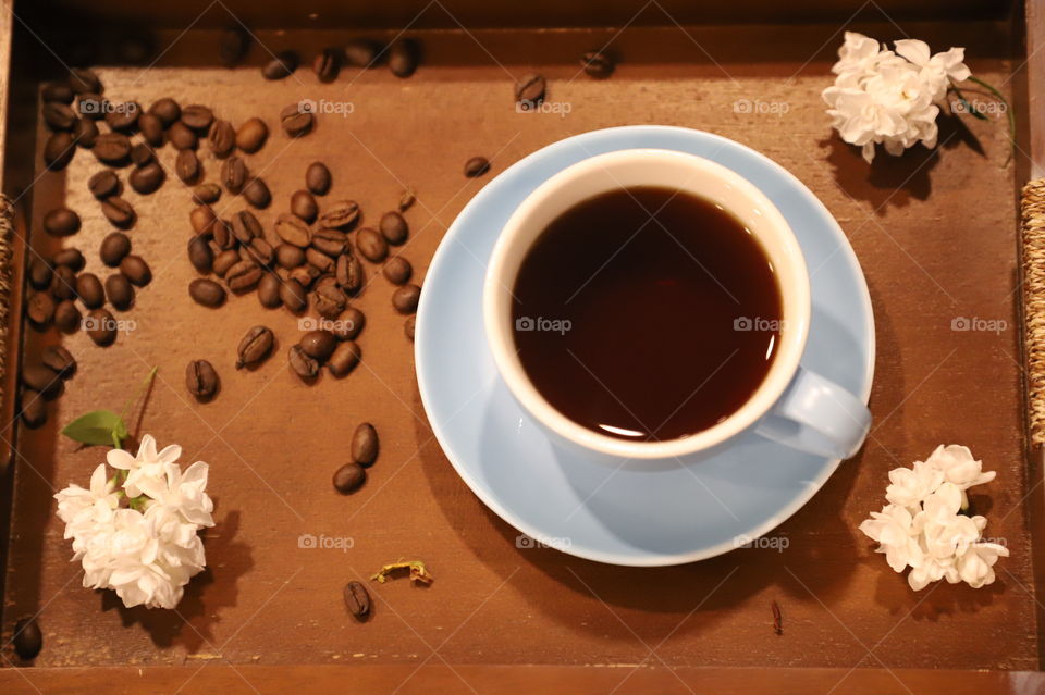 Cup of coffee on a tray