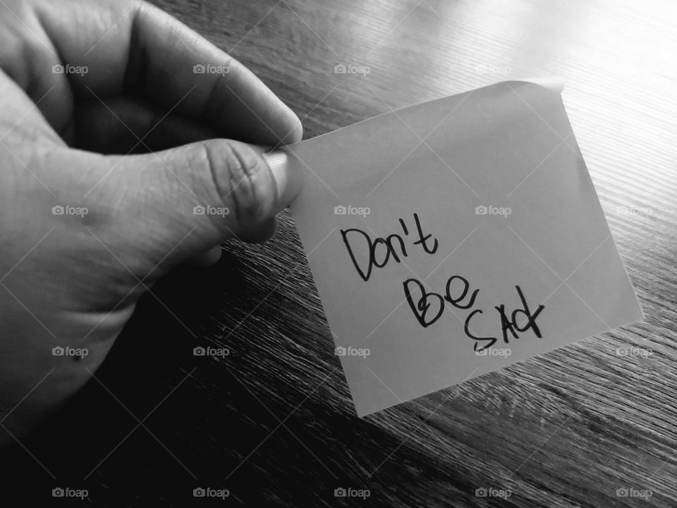 Motivational quotes on a small piece of paper