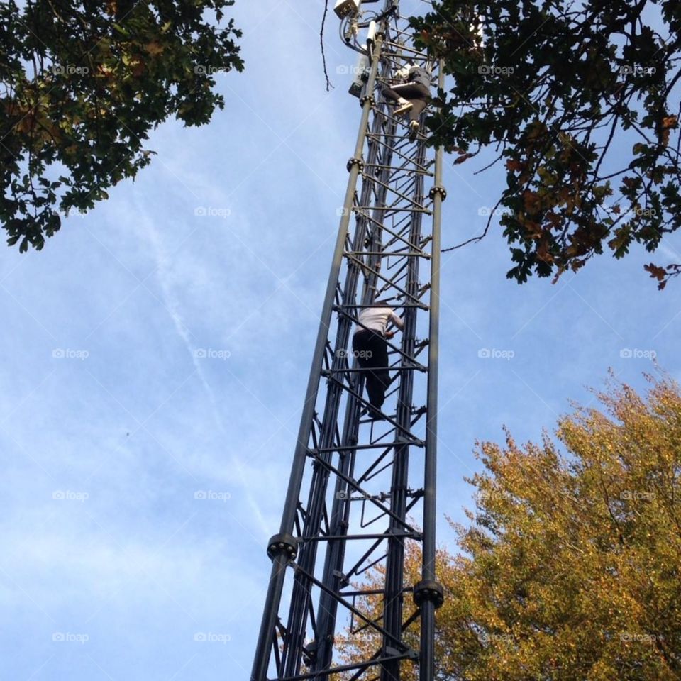 climbing a signal tower