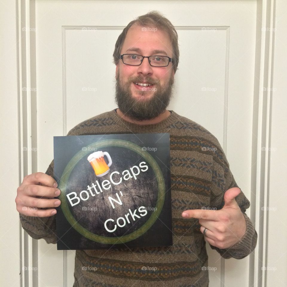 Jonny Havoc holding it up for Bottle Caps N' Corks! 