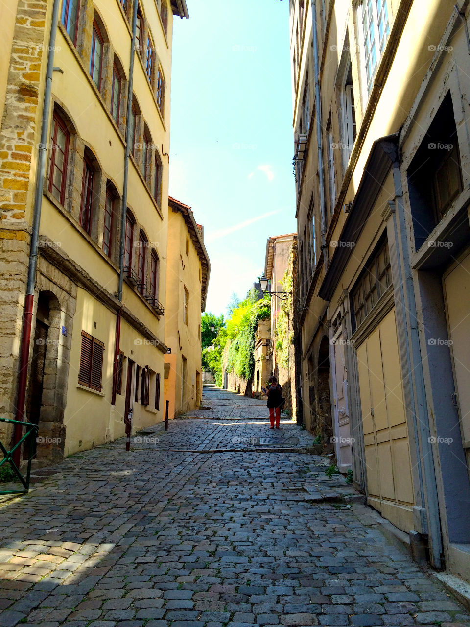 Old narrow street uphill 