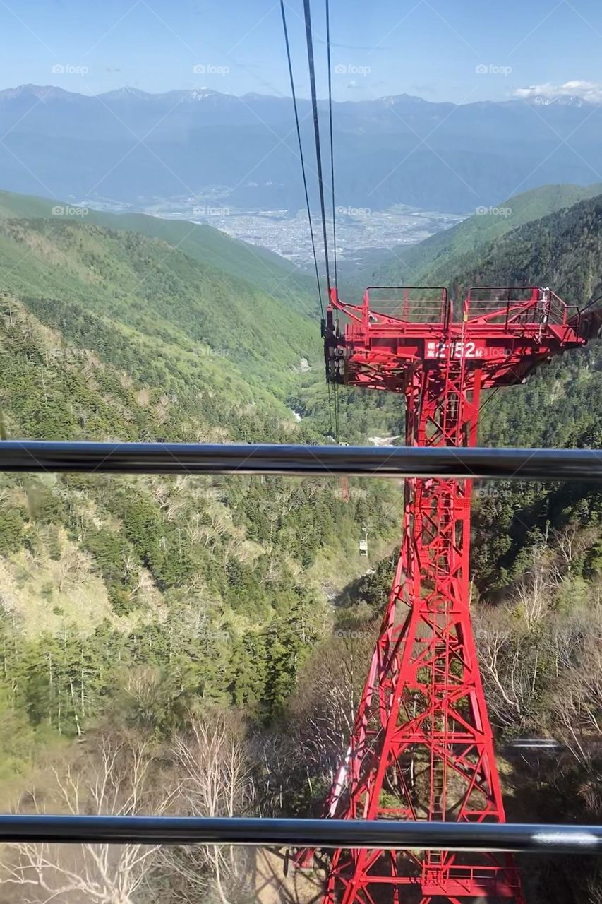 Red ropeway tower