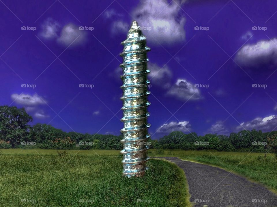 Column sculpture on field