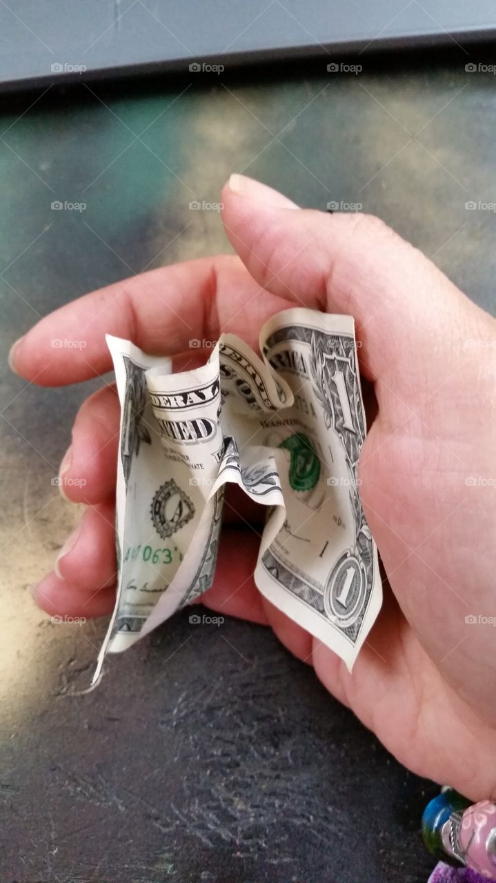 personal point of view, crumpling up a one dollar bill