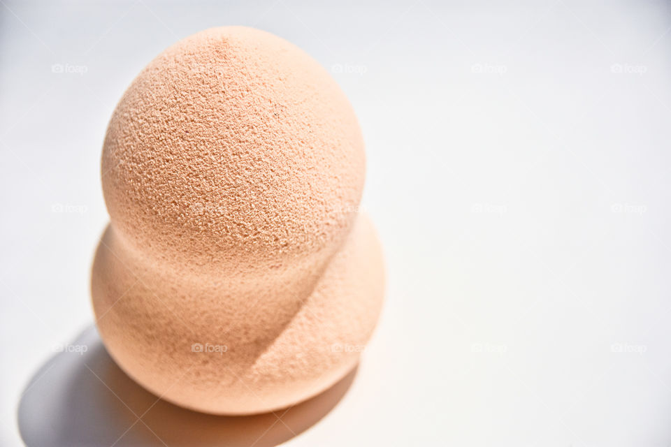 Blending sponge close up on a white background 