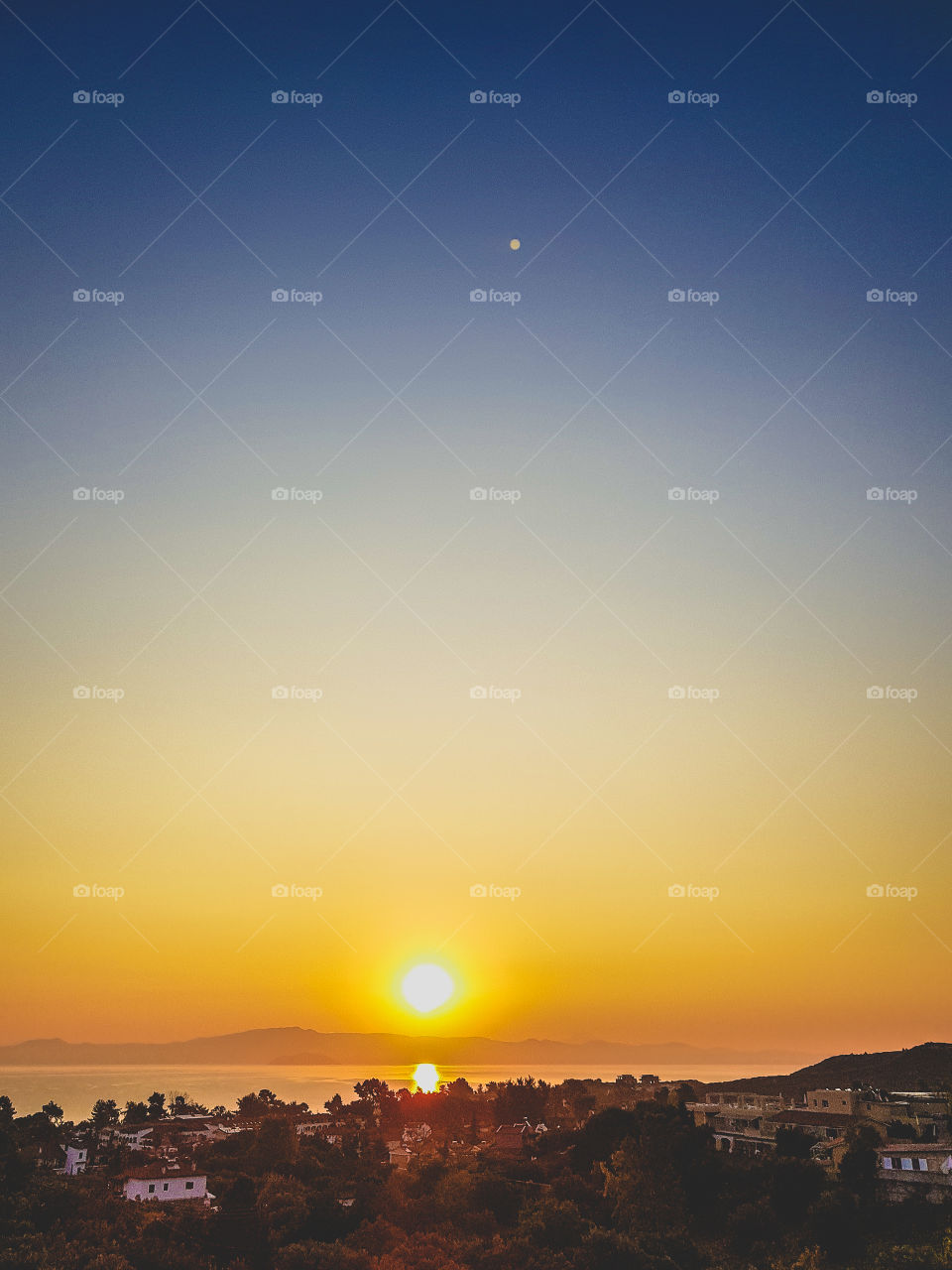 Beautiful sunset with cityscape.