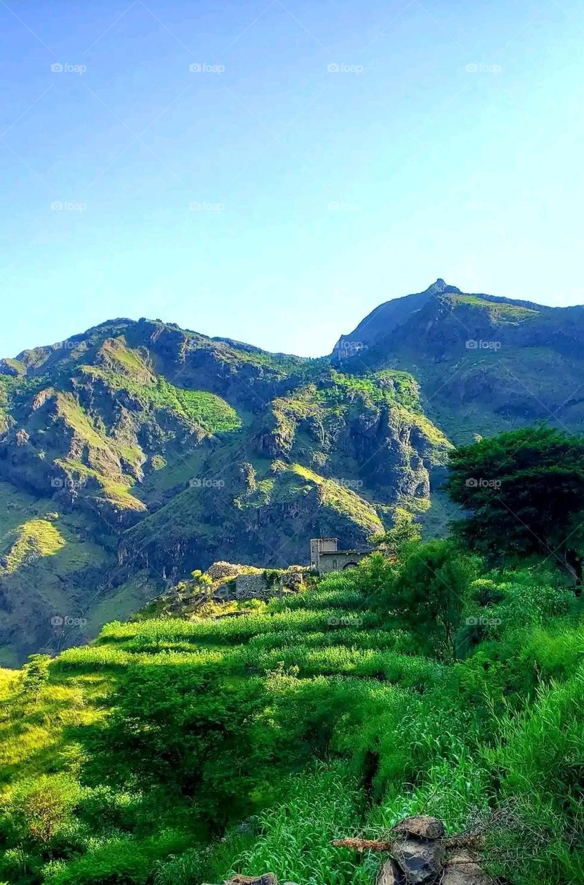 Glory be to God, the magnificent and picturesque view and the natural green trees are a view that is nothing more wonderful than it