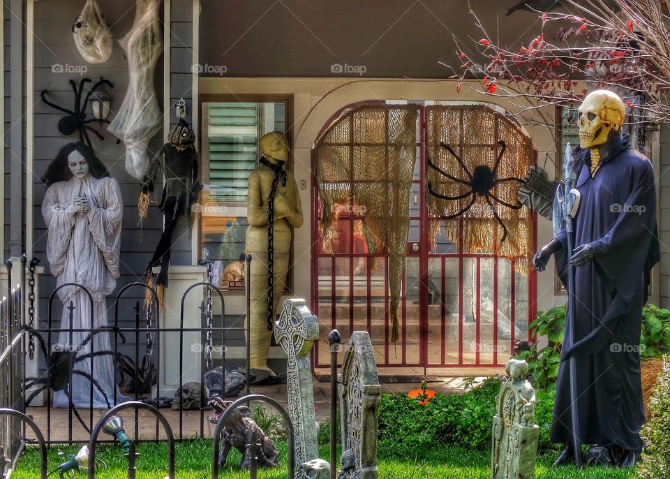 Creepy Yard Display Of Halloween Decorations
