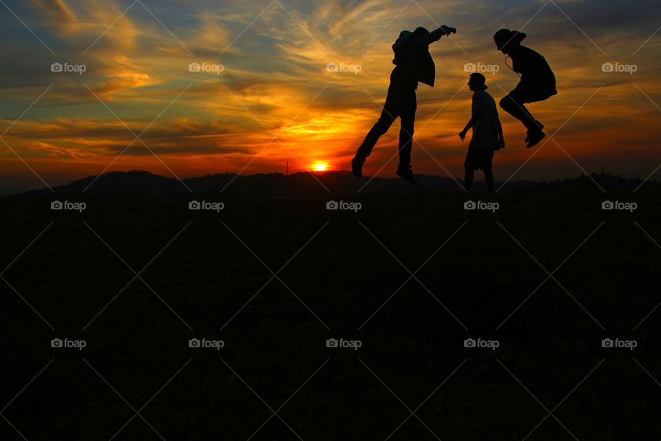 People enjoying in sunset