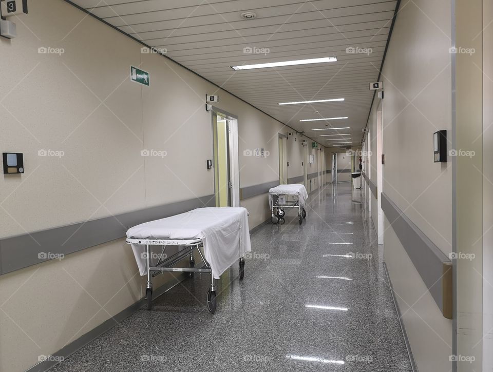 Empty hospital stretchers