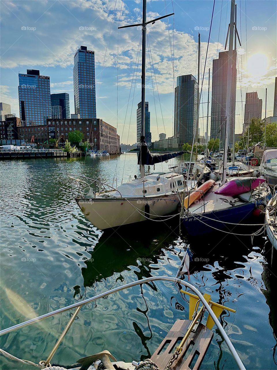 This is beautiful “Newtown Creek” with its many boats seen from aboard “Salvation”, a “28 ft 1969 Luhrs” cabin cruiser by the “Pulaski Bridge” in LIC, Queens on a warm sunny evening in May 2024. Hypnotic Productions