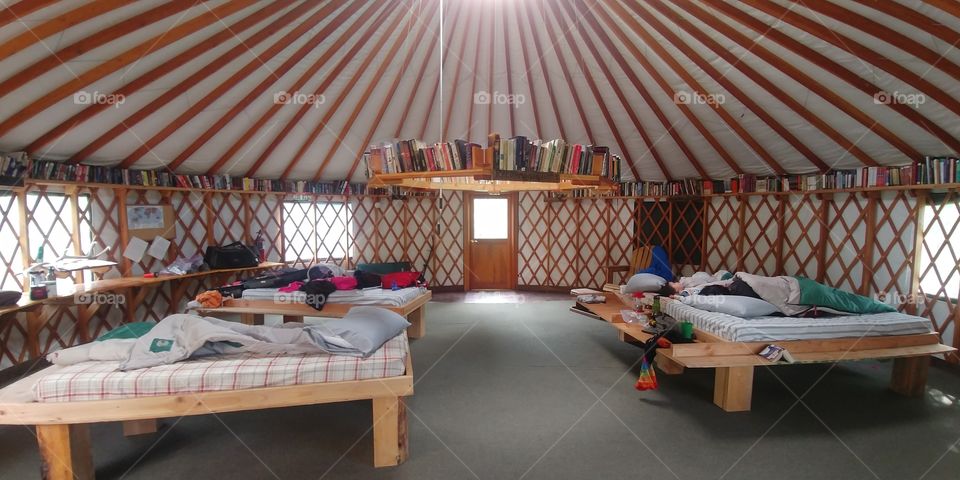 Glamping in a yurt with a library