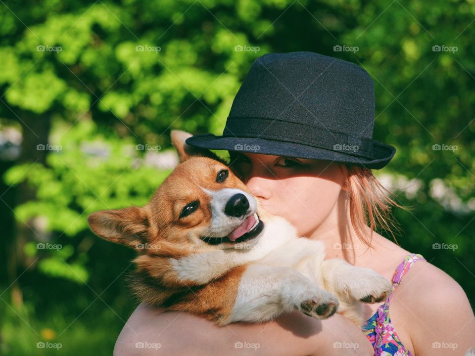 Girl hugging her dog