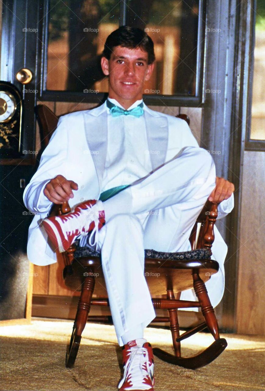 Tuxedo and Tennis Shoes. Taken before we convinced him to wear dress shoes with the tuxedo! 